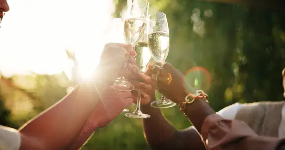 hands-holding-glasses-and-cheers